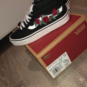 Black and while vans with roses